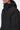 Parka Stanwood Carhartt WIP noire pour homme, avec capuche et poche zippée sur la manche.