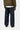 Pantalon Aaron Carhartt WIP pour homme, jean denim brut à coupe ample, porté de dos.