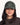 Femme souriante portant une casquette Six Panel Cruising OLOW en velours côtelé vert foncé avec broderie skateboard.