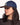 Femme portant une casquette Six Panel Stanton OLOW en jean bleu avec visière en velours côtelé marron et logo.