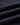 Gros plan du tissu duveteux bleu foncé de la Chemise Sounds en flanelle portugaise, avec des plis et une texture fine.