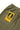 Close-up of the back pocket of Service Works Classic Chef Pants in olive green, featuring the 'Daily Specials Service Works' label.