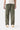Service Works Classic Chef Pants in olive green, featuring a drawstring waist and front patch pockets, worn with white sneakers.