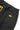 Back view of Classic Chef Pants by Service Works, featuring a black elastic waistband and a back pocket with a yellow logo tag.