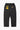 Service Works Classic Chef Pants in black, back view, showing yellow brand labels and elastic waistband.
