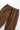 Brown Classic Chef Pants by Service Works, featuring an elastic waist and drawstring detail, shown close-up.
