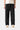 Service Works Classic Chef Pants in black, front view, with drawstring waist, patch pockets, worn with white shirt and sneakers.