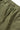 Classic Chef Shorts | Service Works. Close-up of olive green fabric with elasticated waistband and adjustable drawstring.