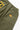 Service Works Classic Chef Shorts, olive green. Back view with elastic waist, pocket, yellow brand tag, and 'Daily Specials' label.