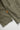 Close-up of the olive green fabric and an orange 'Service Works' tag on the Easy Chef Shirt.