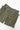 Service Works Gardener Shorts in olive green, featuring elastic waist, button closure, and side utility pockets with drawstrings