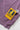 Purple Service Works Gardener Vest, highlighting the yellow 'Daily Specials Sanforized Garments' tag and logo patch.
