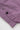 Close-up of Service Works Gardener Vest in purple, highlighting fabric texture, a silver snap, and a black button on a utility strap.