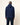 Homme portant un Hoodie Terry Homecore bleu marine et un pantalon assorti sur un fond clair.