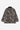Dos du Manteau Lander Carhartt WIP avec motif camouflage réaliste de branches et feuilles, col en velours côtelé noir.