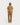 Homme debout portant le pantalon Homecore Maji Bio Pant Root Brown et un t-shirt marron, look décontracté.