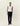 Pantalon de Costume Regular en Laine Les Deux pour homme, de couleur bleu foncé, porté avec un débardeur blanc.