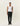 Pantalon de Costume Regular en Laine Les Deux pour homme, de couleur vert foncé, porté avec un débardeur blanc.