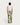 Back view of man in white tank top and HOMECORE Pantalon Hemming M90 with green, olive, off-white abstract pattern.