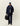 Parka Matelassée Les Deux bleu marine pour homme, avec pantalon assorti, casquette et sac de voyage.