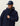 Parka matelassée Les Deux bleu marine, portée par un homme avec une casquette assortie.
