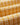 Polen Yellow Portuguese Flannel. Tissu jaune en flanelle avec motif tissé blanc, plié, doux et texturé.