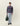 Homme portant un Pull Col Rond Dégradé Les Deux aux couleurs violet, bleu et vert, avec un jean ample et un sac.