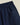 Shorts Atlantico Bleu Marine Portuguese Flannel. Vue détaillée de la taille élastique et de la poche arrière sur tissu texturé.