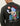Sweat Rural Rosin Green Les Deux. Dos brodé d'une illustration colorée: personnage, fleurs, bouteille, ballon. Mode homme.