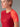 Femme en T-shirt 100% Mérinos BIAFO AYAQ rouge et orangé, manches raglan. Vue de profil.