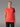 Femme portant un T-shirt 100% Mérinos BIAFO AYAQ orange et rouge, manches courtes.