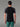 Vue arrière d'un homme portant le T-shirt 100% Mérinos BIAFO AYAQ noir à manches raglan grises.