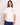 Homme portant le T-Shirt Melody OLOW blanc & broderie vase bleu, coupe d&eacute;contract&eacute;e.