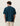 Vue de dos d'un homme portant le T-Shirt Mesh Check Les Deux turquoise et noir à carreaux.
