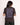 Dos d'une femme portant un T-shirt Taijitu OLOW noir avec un motif complexe Yin Yang et symboles spirituels en violet clair.